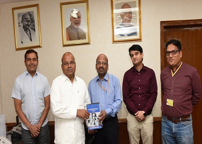 The Chairman of the Foundation and Honourable Minister of SJ&amp;E, Dr. Thaawarchand Gehlot releasing the books in presence of Member Secretary and Director of the Foundation, along with Senior Officers of the Ministry of Social Justice and Empowerment